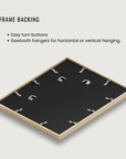 The back side of our picture frame showing easy turn buttons, and sawtooth hangers for horizontal or vertical hanging.