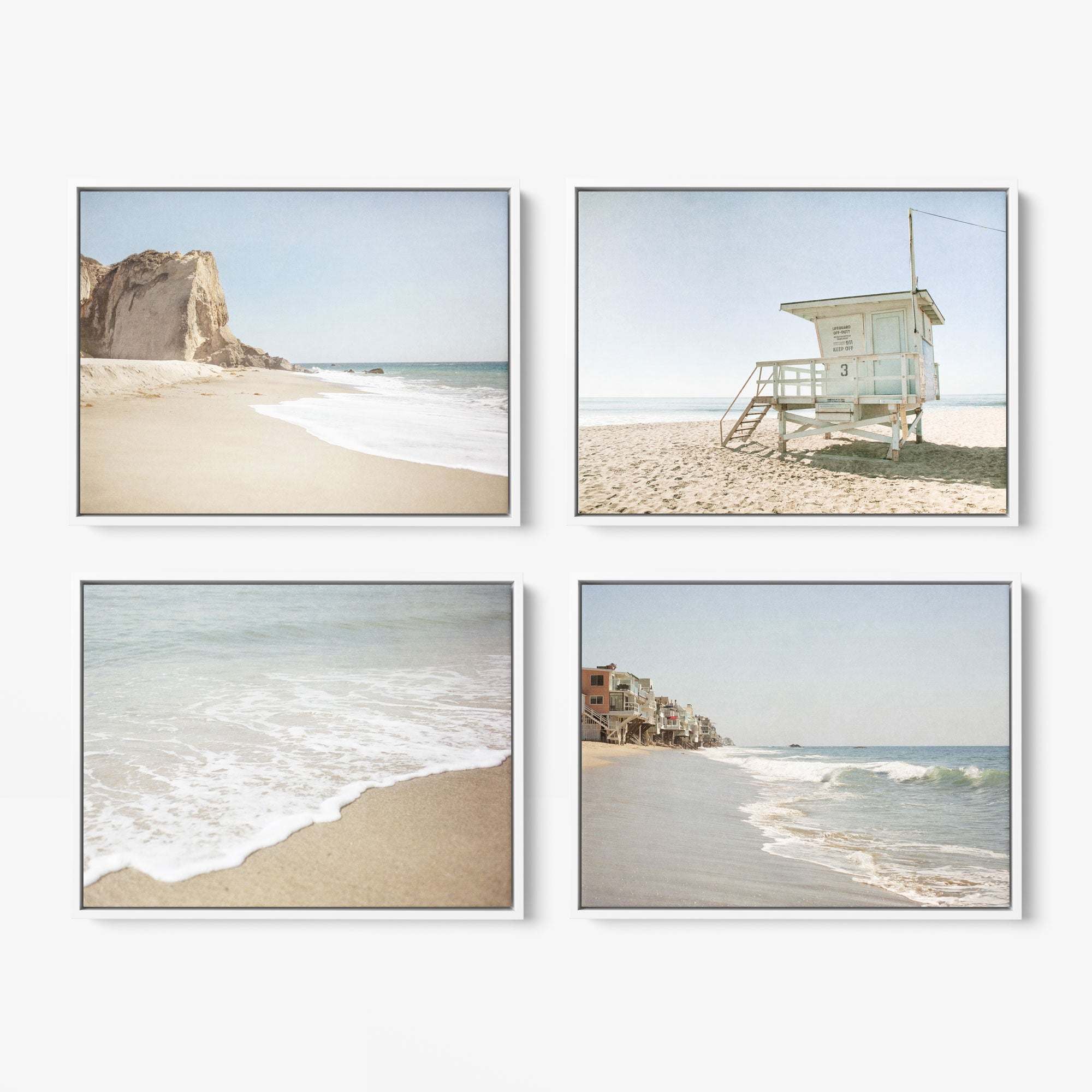 Offley Green offers a Set of 4 Framed Canvas 24x30 featuring beach scenes: a sandy beach with a rocky cliff, a lifeguard tower, waves on the shore, and beachside houses. Sourced from renewable forests for sustainability.