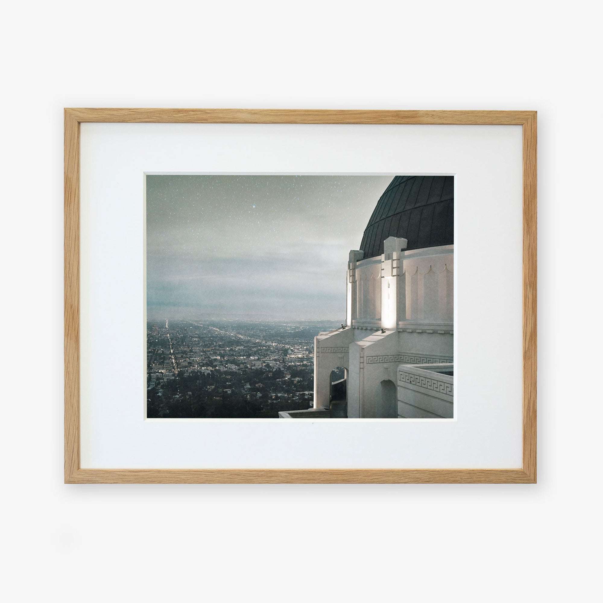 Framed archival photographic Griffith Observatory Print, &#39;The Sky At Night&#39; of a Los Angeles city view at dusk viewed from a high vantage point next to the Griffith Observatory, showcasing a twinkling skyline under a soft, dark sky by Offley Green.