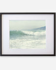Coastal print of a breaking wave 'Breaking Surf' from Offley Green, framed in black with a white mat, capturing a serene oceanic scene.