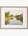 A framed photograph depicting the Venice Beach Canals, printed on archival photographic paper by Offley Green.
