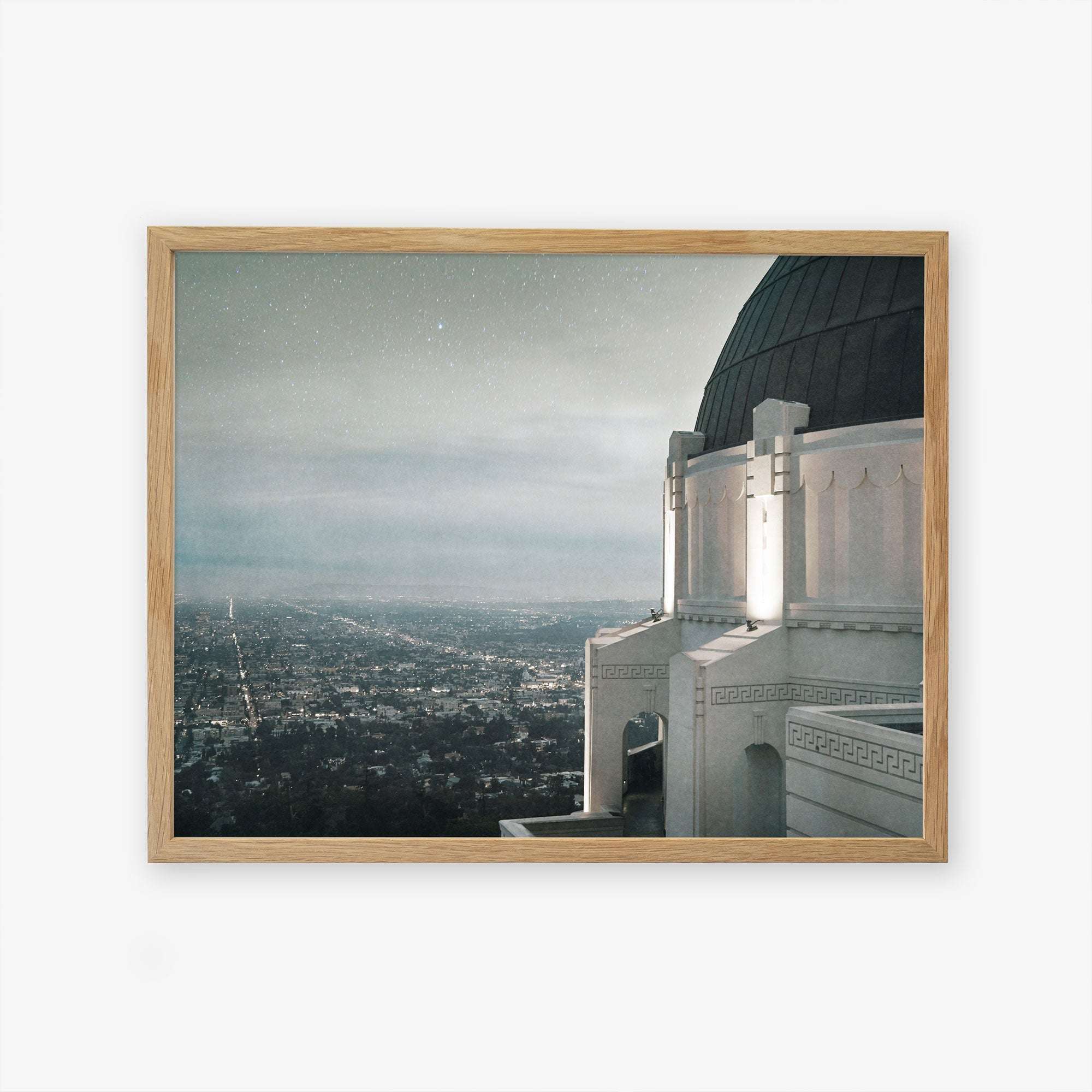 A framed archival photographic print showing the Offley Green Griffith Observatory Print, &#39;The Sky At Night&#39; overlooking the Los Angeles cityscape at twilight, with stars beginning to appear in the sky above.