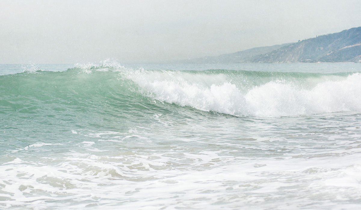 Scene from one of Offley Green's coastal prints, 'breaking waves' taken on Will Rogers State Beach in the Pacific Palisades.