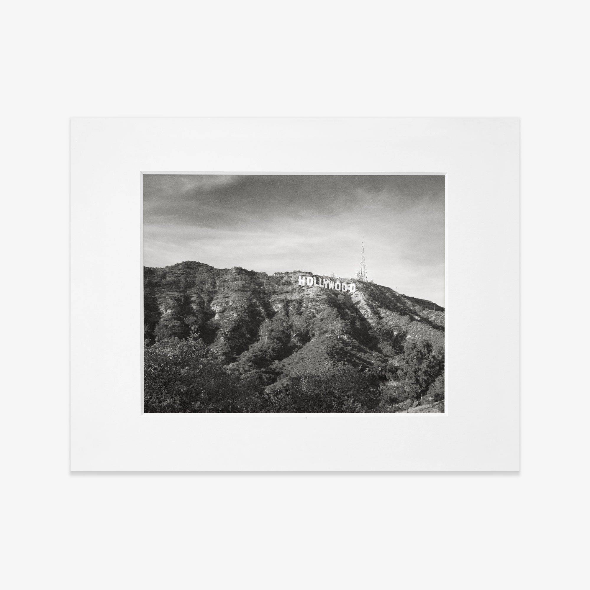 Black and white photograph of the Offley Green Hollywood Sign Black and White Vintage Print, &#39;Old Hollywood&#39; on archival photographic paper, framed within a white border.