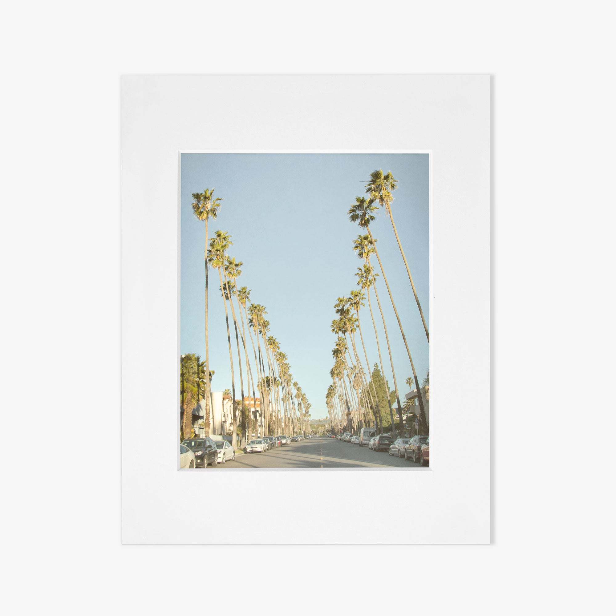 A simplistic white square frame with a clean design, showcasing an empty gray central area suitable for displaying artwork or a photograph of Los Angeles Palm Tree Lined Street &#39;Sunset Boulevard Dreams&#39; by Offley Green.