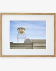 A framed photograph of a water tower labeled "gray power" above Sony Studios, set against a clear sky - Offley Green's Los Angeles Sony Pictures Studio Print, 'Sony Lot'