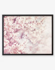 Framed artwork featuring the 'Dreamy Blossom' Pink Floral Print by Offley Green, a close-up photograph of pink cherry blossoms against a soft, blurred background, printed on archival photographic paper. The image conveys a serene and delicate spring scene.