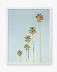 A framed Los Angeles Palm Tree Photographic Print 'Palm Tree Steps' by Offley Green, featuring five tall palm trees against a clear sky in a minimalist California style with a focus on vertical lines and light colors.