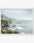 Framed artwork of a serene coastal landscape along California Highway 1, featuring rocky cliffs and a misty ocean extending into the distance under a soft, hazy sky by Offley Green's Big Sur Landscape Print, 'Rocky Rocks'.