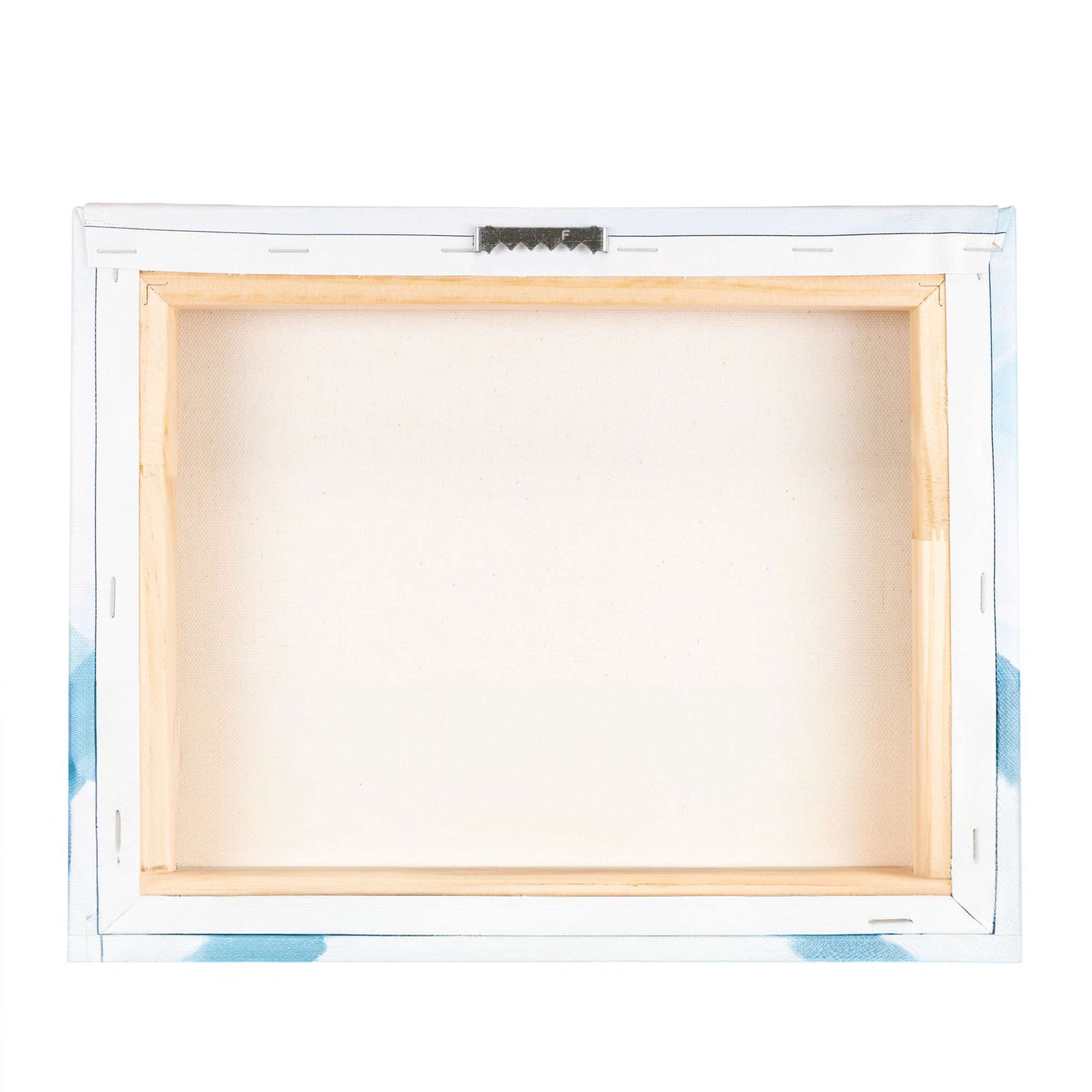 The image shows the backside of an 11x14 California Canvas Print (Choose from 10+ Designs) gallery wrap framed with a wooden stretcher, ready for painting. The canvas is stapled to the wooden frame, with small metal brackets on the top edge for hanging. The background is white and slightly ombre with blue hues. This product is by Offley Green.
