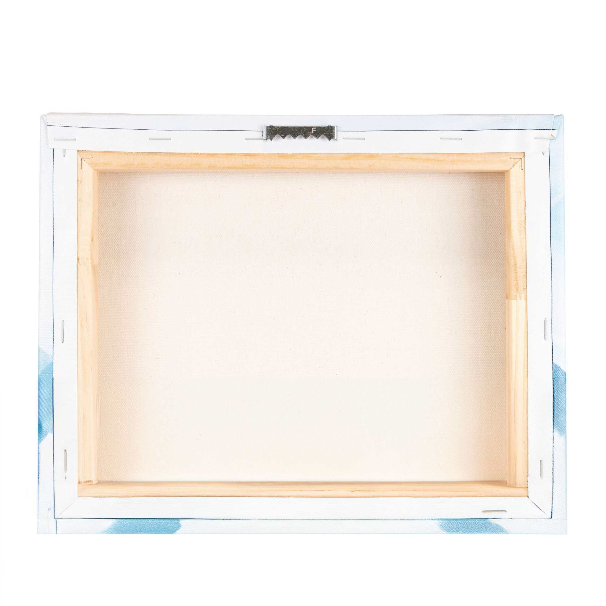 Back view of the Offley Green 8x10 Rustic Canvas Print, featuring a light wooden frame and metal hanger for wall mounting. The rectangular canvas has corners subtly covered with blue and white fabric, ensuring elegance and sourced from FSC certified forests. Choose from 10+ designs.