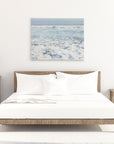 Bedroom canvas wall art featuring a coastal scene of surf breaking on a beach