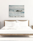 Bedroom canvas wall art featuring a coastal scene of waves breaking over rocks
