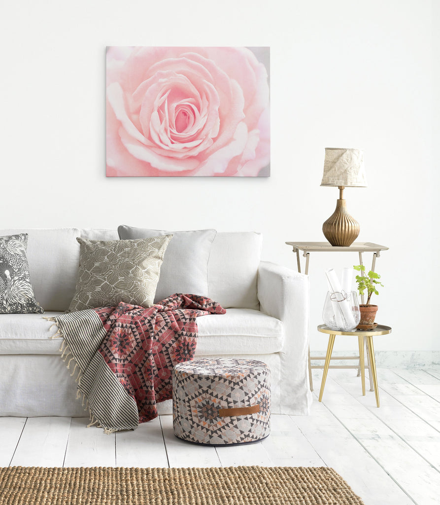 Living room wall art featuring a pink rose on canvas