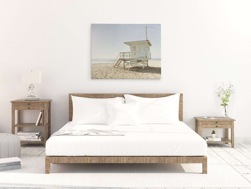 Coastal themed living room wall art featuring a Malibu Lifeguard Tower print on canvas