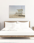 Coastal themed living room wall art featuring a Malibu Lifeguard Tower print on canvas